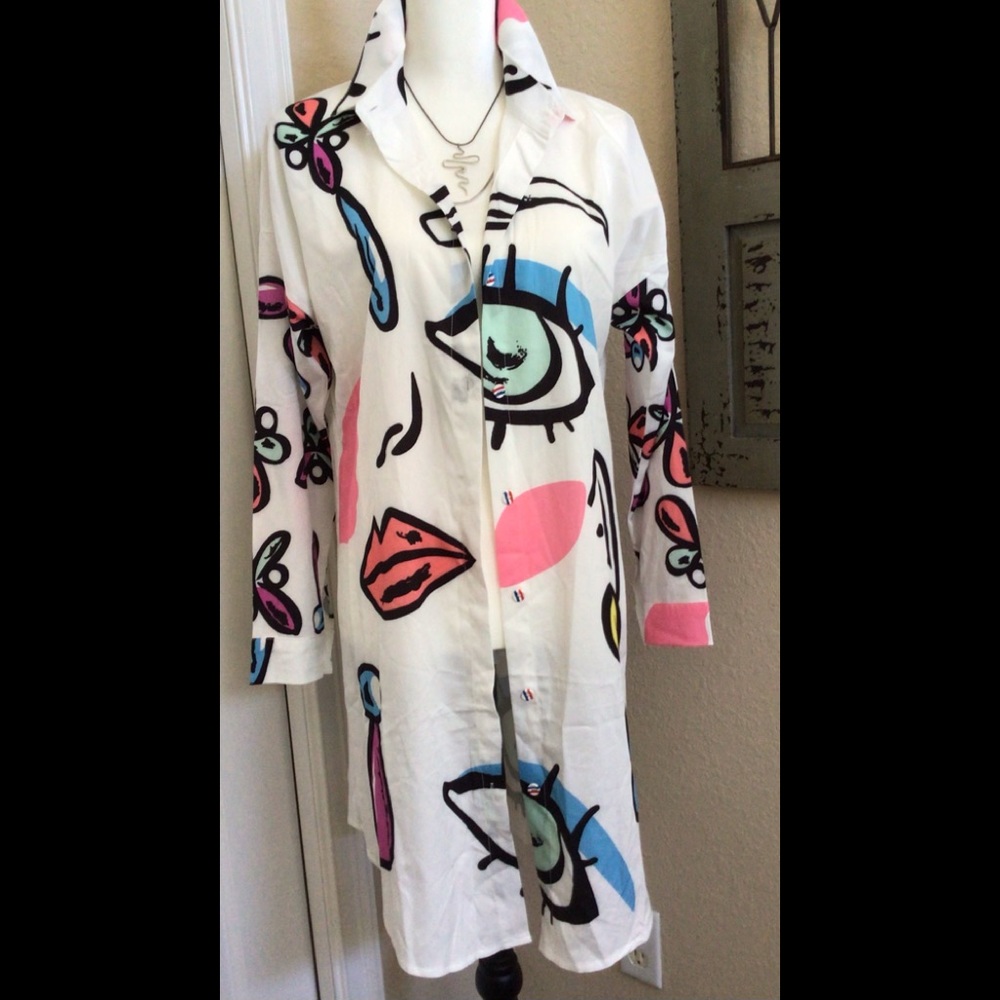 Button front tunic blouse. Brand new never worn